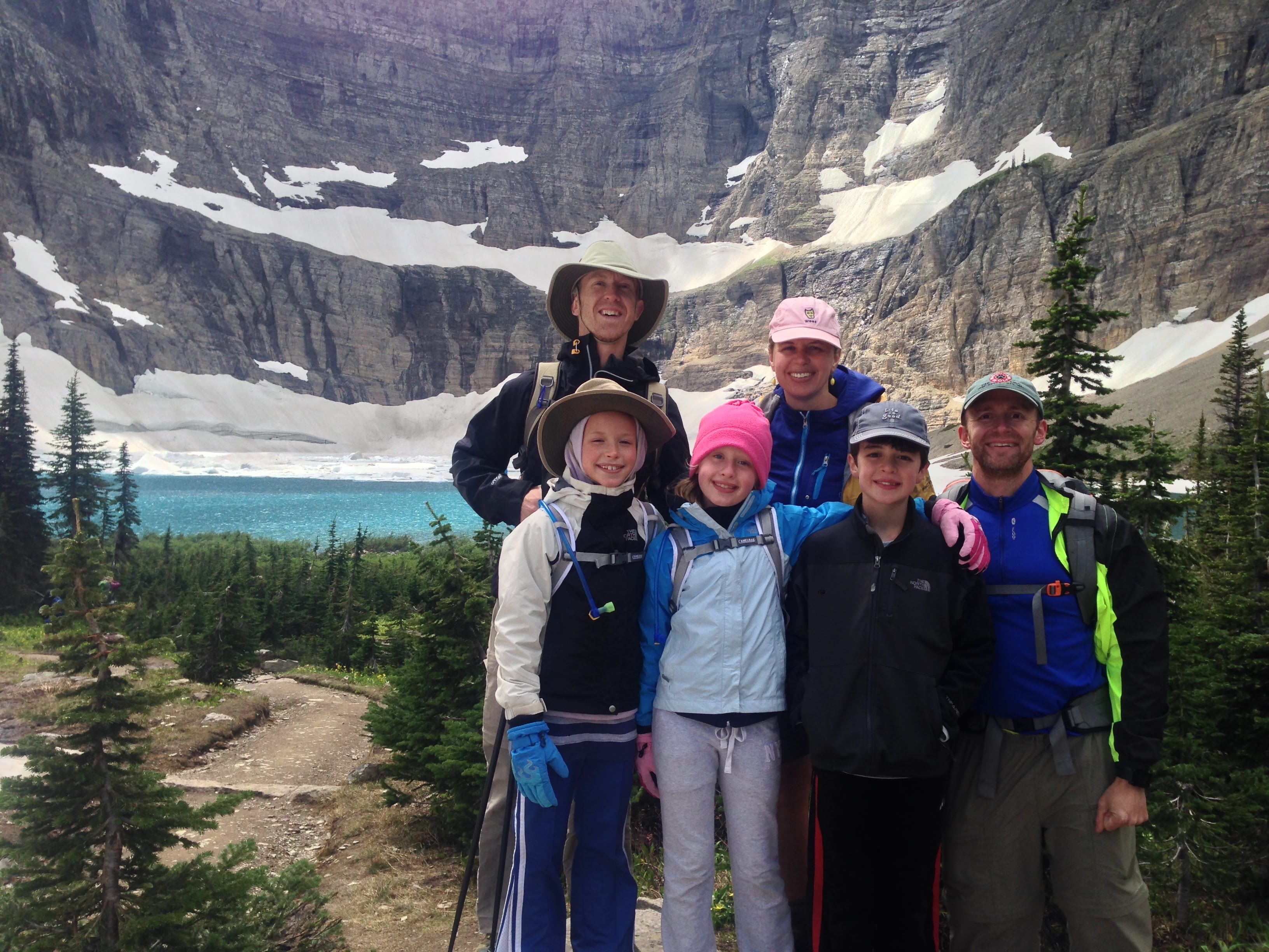 people in front of mountains and lake7