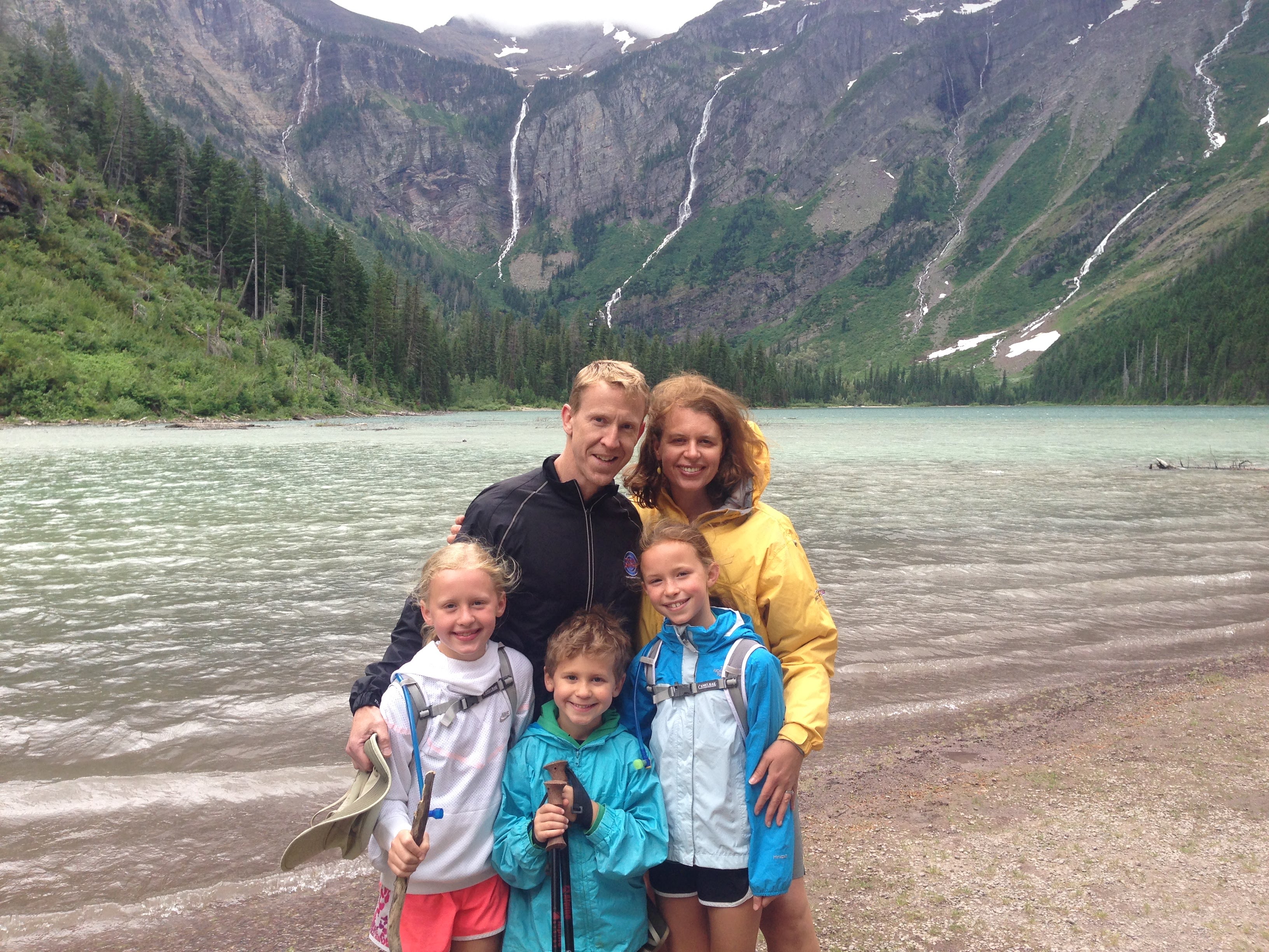 people in front of mountains and lake14