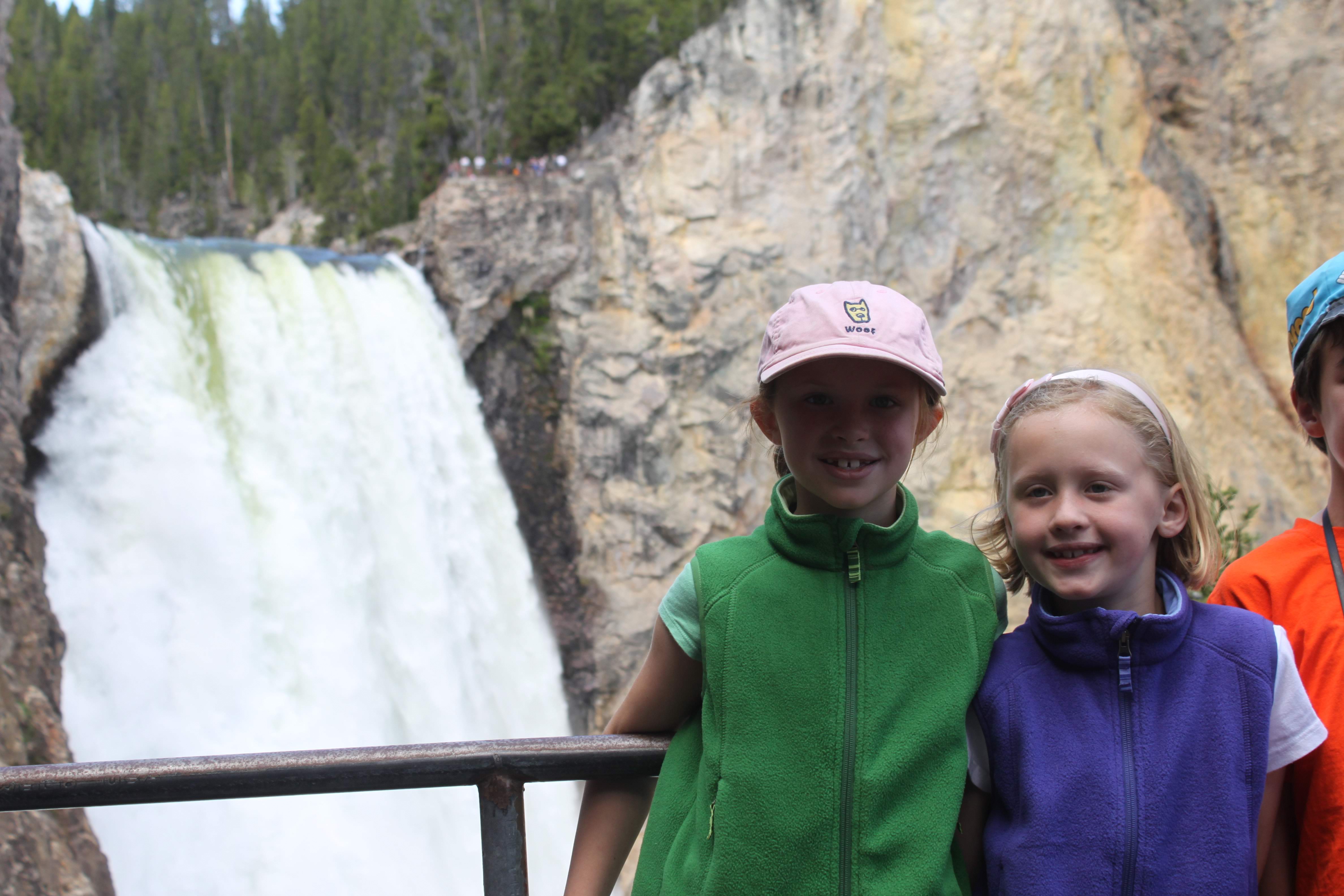 People in front of waterfall