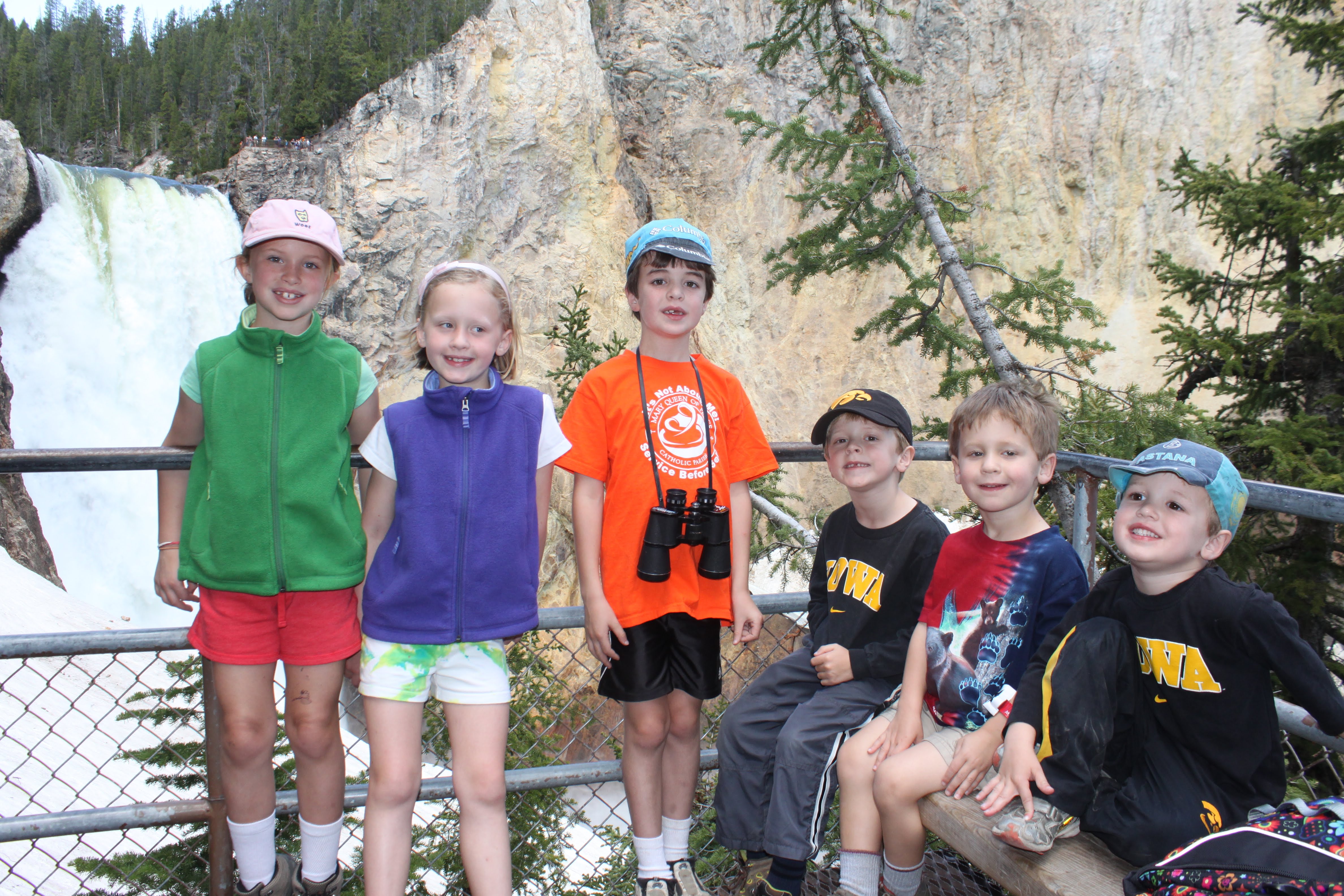 People in front of a waterfall